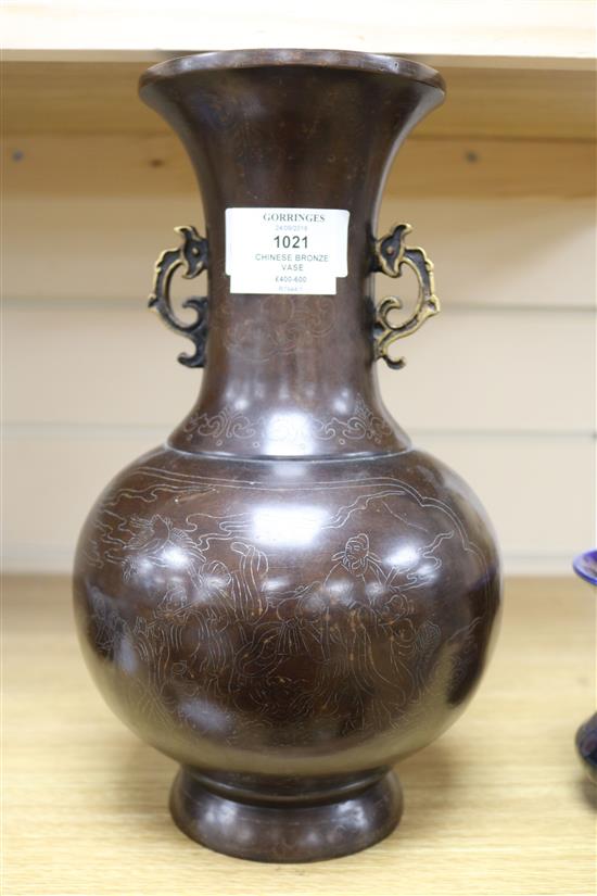A Chinese bronze vase with silver inlay height 30.5cm